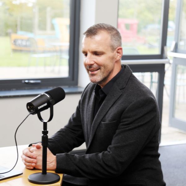 Mike Sherwood speaking on a medical aesthetics industry podcast